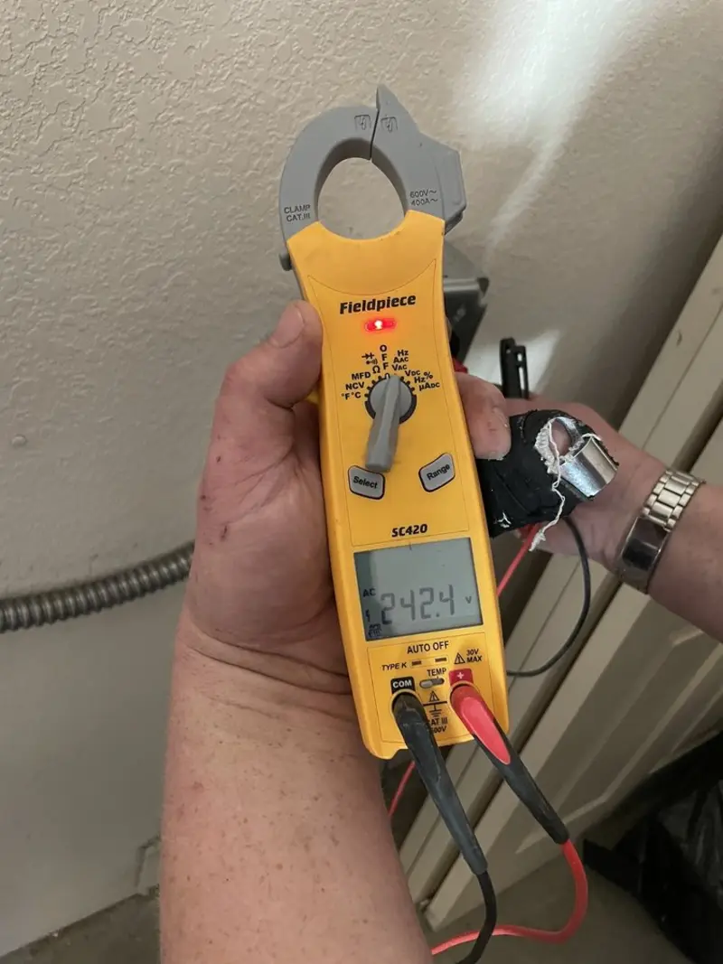 Voltage testing with clamp meter during Ceiling Fan Installation in Terrace Heights